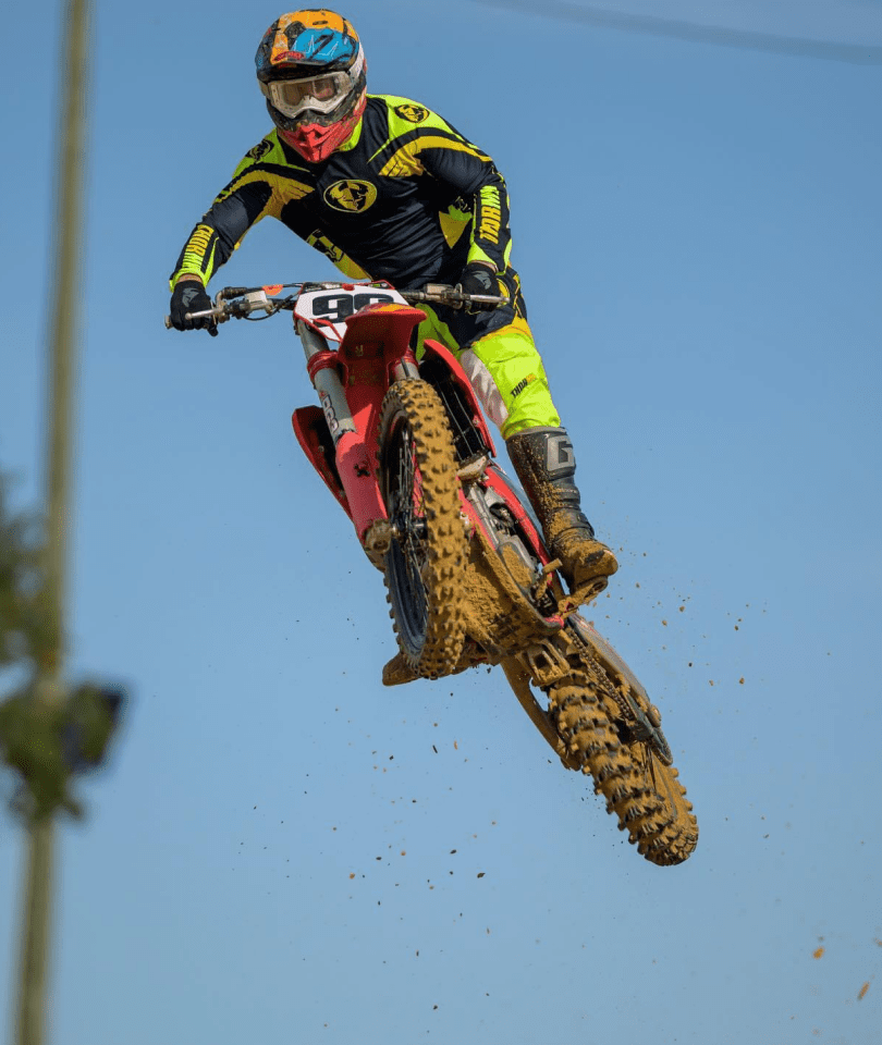 A man on a motorcycle jumping in the air.